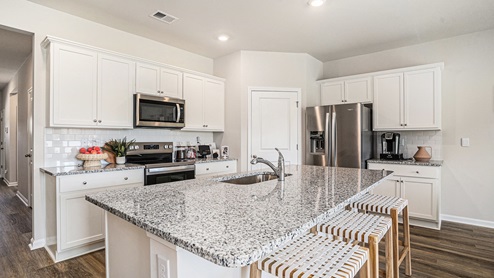 kitchen with white cabinets