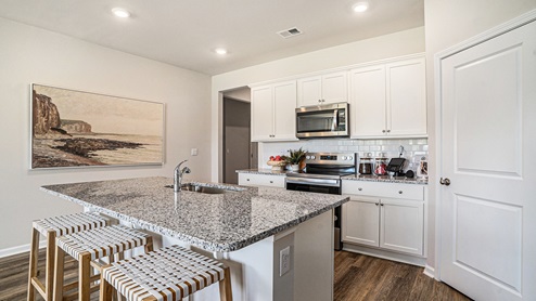 kitchen with white cabinets