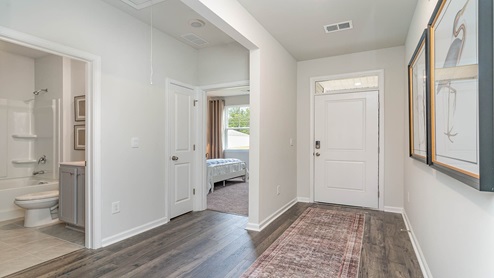foyer with vinyl plank flooring