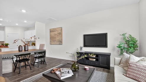 living room with revwood flooring