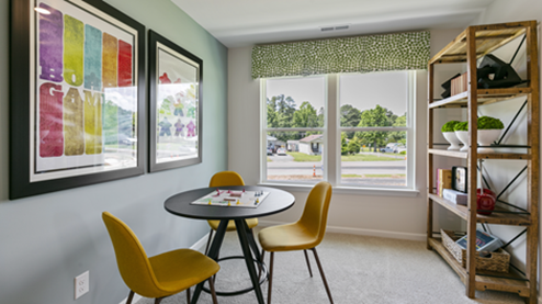 upstairs flex room featuring a game table