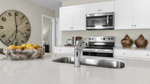 Kitchen with white cabinets