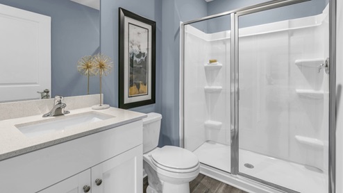 Bathroom with white cabinets