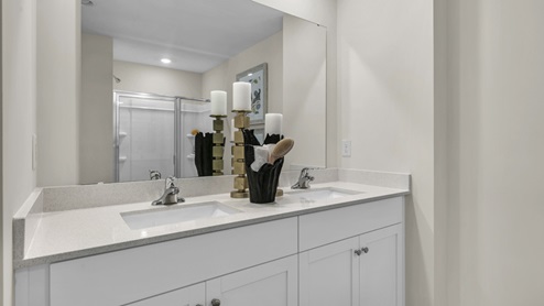Bathroom with white cabinets