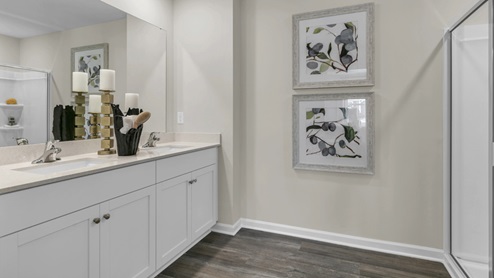 Bathroom with white cabinets