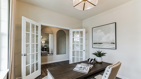 Office nook with double glass doors.