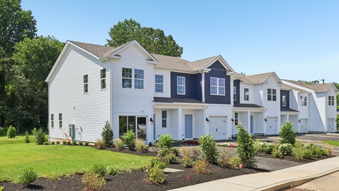 A side view exterior photo of the the model townhome