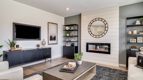 Great room with laminate flooring and an electric fireplace