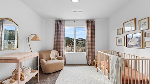 Secondary bedroom with one large window.