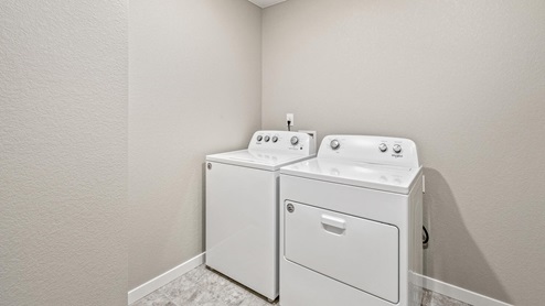 white washer and dryer in laundry room