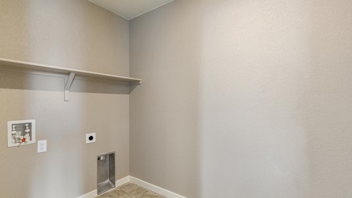 laundry room with washer and dryer hook up