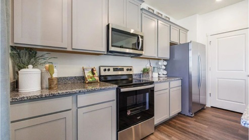 stainless steel appliances kitchen with an island