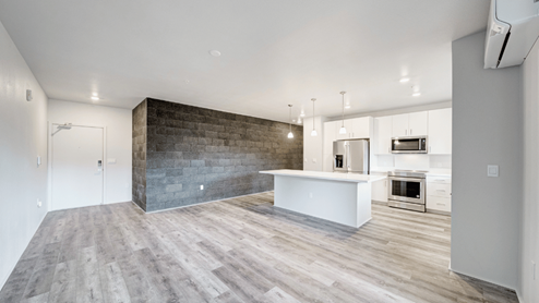 Interior kitchen island open to the living room