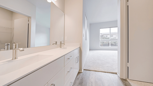 Interior bathroom with toilet and full sized shower