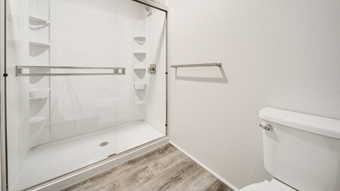Interior walk in closet with shelves