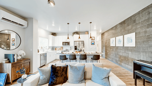 Interior living room open to the kitchen