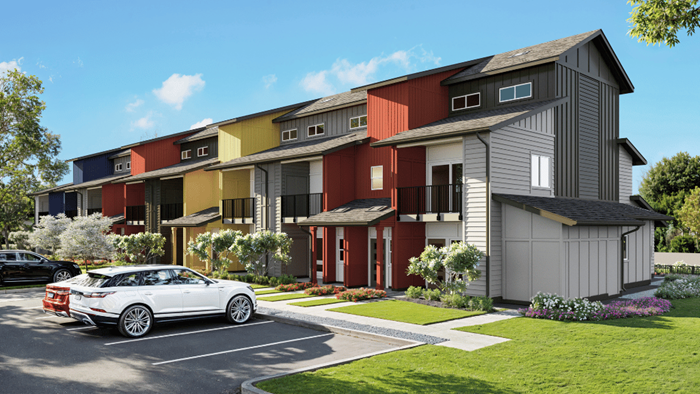 Exterior three story building with yellow and red wood cladding