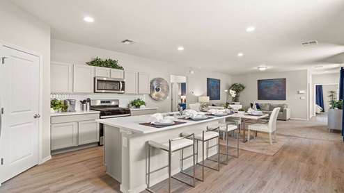 kitchen with island and gray cabinets