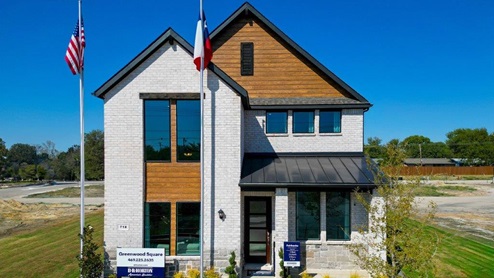 Two story home with brick and stone exterior