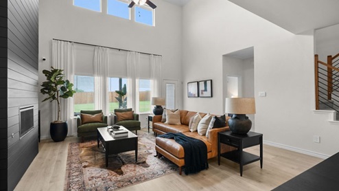 Interior living area with large windows and fire place