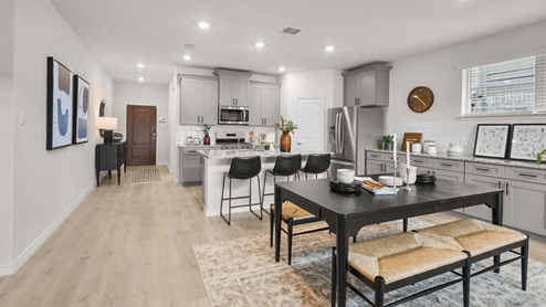 Interior dining area open to kitchen and living area
