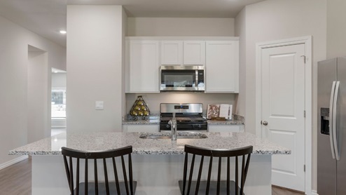 Welcome to The Estates at Conrad Village community in Bixby, Oklahoma, where the Justin floor plan embodies the perfect blend of modern design and small-town charm. As you explore the streets lined with brick or brick and rock exterior elevations, you'll feel a sense of belonging in this welcoming neighborhood. The Justin offers 1831 square feet of spacious living space, featuring 4 bedrooms and 2 bathrooms, designed to accommodate the needs of your family. Step inside and be greeted by an inviting open-concept layout, where the kitchen seamlessly overlooks the combination living and dining area. Designed with both style and functionality in mind, the kitchen boasts painted cabinetry, granite countertops, and luxury vinyl wood flooring. Large windows in the living room flood the space with natural light, creating a warm and inviting atmosphere. Stainless steel appliances add a touch of sophistication to the heart of the home. Indulge in the luxurious 12x24 marble tile surround in both the primary and secondary bathrooms, creating a spa-like retreat for your daily routines. With carpeted floors in the bedrooms, comfort is never compromised. Retreat to the primary bedroom, where relaxation awaits. Enjoy the convenience of an attached bathroom with a walk-in closet, double vanity, and a separate toilet for added privacy. Experience the convenience of smart home features throughout the Justin floor plan, adding modern technology to your everyday life. Don't miss your chance to make the Justin your new home in The Estates at Conrad Village community. Contact us today to schedule a tour and discover why this floor plan is the perfect combination of style, comfort, and functionality for your family's needs. Your dream home awaits!