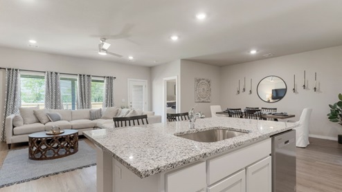 Welcome to The Estates at Conrad Village community in Bixby, Oklahoma, where the Justin floor plan embodies the perfect blend of modern design and small-town charm. As you explore the streets lined with brick or brick and rock exterior elevations, you'll feel a sense of belonging in this welcoming neighborhood. The Justin offers 1831 square feet of spacious living space, featuring 4 bedrooms and 2 bathrooms, designed to accommodate the needs of your family. Step inside and be greeted by an inviting open-concept layout, where the kitchen seamlessly overlooks the combination living and dining area. Designed with both style and functionality in mind, the kitchen boasts painted cabinetry, granite countertops, and luxury vinyl wood flooring. Large windows in the living room flood the space with natural light, creating a warm and inviting atmosphere. Stainless steel appliances add a touch of sophistication to the heart of the home. Indulge in the luxurious 12x24 marble tile surround in both the primary and secondary bathrooms, creating a spa-like retreat for your daily routines. With carpeted floors in the bedrooms, comfort is never compromised. Retreat to the primary bedroom, where relaxation awaits. Enjoy the convenience of an attached bathroom with a walk-in closet, double vanity, and a separate toilet for added privacy. Experience the convenience of smart home features throughout the Justin floor plan, adding modern technology to your everyday life. Don't miss your chance to make the Justin your new home in The Estates at Conrad Village community. Contact us today to schedule a tour and discover why this floor plan is the perfect combination of style, comfort, and functionality for your family's needs. Your dream home awaits!