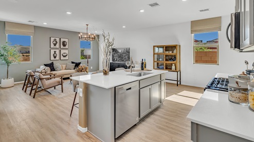 Discover new homes within the only gated community in Gladden Farms. Coronet at Gladden Farms, a premier D.R. Horton community where modern living meets the scenic charm of Marana, Arizona. Located within the expansive Gladden Farms master-planned neighborhood, Coronet offers residents the perfect blend of small-town warmth and modern amenities. Surrounded by 830 acres of green space, 28 parks, and 19 playgrounds, this gated community is designed for families who value both comfort and outdoor adventure. Residents of Coronet at Gladden Farms enjoy exclusive amenities such as a sparkling community pool, jacuzzi, fitness center, and a clubhouse complete with a BBQ area and patio. The gated community also offers walking trails, a dog park, and playgrounds, making it the ideal environment for families and active lifestyles. Each home is thoughtfully designed with high-end finishes, including quartz countertops, wood-look luxury vinyl plank flooring, tile roofs, Spanish Lace stucco exteriors and beautifully landscaped front yards with auto drip irrigation. Additionally, all homes feature covered front porches and back patios, perfect for enjoying the stunning Arizona sunsets and monsoons. Coronet at Gladden Farms is built with a commitment to energy efficiency and sustainability. Each home meets the DOE Zero Energy Ready Home standards, meaning they are constructed to be so energy-efficient that a renewable energy system could offset most or all of the home's annual energy use. These homes include advanced features such as tankless water heaters, energy-efficient LED lighting, and high-performance insulation, ensuring lower utility costs and a reduced environmental footprint. The Home is Connected Smart Home package, which includes a smart thermostat, video doorbell, keyless entry, a Wi-Fi-enabled garage door opener, and much more, provides modern convenience and enhanced security. Living in Coronet at Gladden Farms means being part of a thriving community with easy access to shopping, dining, and recreation. The greater Gladden Farms area is equipped with amenities like a splashpad, soccer fields, and the Paws & Claws Dog Park. With the new Fry’s Marketplace, along with Starbucks and Ace Hardware, all your daily needs are just moments away. Families will appreciate being part of the Marana Unified School District, with Gladden Farms Elementary nearby and a new K-8 school opening in 2025. Beyond the community, residents can explore the natural beauty of the area with proximity to Picacho Peak State Park, Tortolita Mountain Park, and Saguaro National Park, offering endless opportunities for hiking, cycling, and wildlife viewing. Major employers such as Davis-Monthan Air Force Base, Raytheon, and Ventana Medical Systems are just a short drive away, making Coronet at Gladden Farms an ideal location for those commuting to Tucson, Casa Grande, or Phoenix. Experience the perfect blend of comfort, convenience, and community at Coronet at Gladden Farms—where new homes, energy efficiency, and a vibrant lifestyle await.