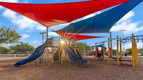 Discover new homes within the only gated community in Gladden Farms. Coronet at Gladden Farms, a premier D.R. Horton community where modern living meets the scenic charm of Marana, Arizona. Located within the expansive Gladden Farms master-planned neighborhood, Coronet offers residents the perfect blend of small-town warmth and modern amenities. Surrounded by 830 acres of green space, 28 parks, and 19 playgrounds, this gated community is designed for families who value both comfort and outdoor adventure. Residents of Coronet at Gladden Farms enjoy exclusive amenities such as a sparkling community pool, jacuzzi, fitness center, and a clubhouse complete with a BBQ area and patio. The gated community also offers walking trails, a dog park, and playgrounds, making it the ideal environment for families and active lifestyles. Each home is thoughtfully designed with high-end finishes, including quartz countertops, wood-look luxury vinyl plank flooring, tile roofs, Spanish Lace stucco exteriors and beautifully landscaped front yards with auto drip irrigation. Additionally, all homes feature covered front porches and back patios, perfect for enjoying the stunning Arizona sunsets and monsoons. Coronet at Gladden Farms is built with a commitment to energy efficiency and sustainability. Each home meets the DOE Zero Energy Ready Home standards, meaning they are constructed to be so energy-efficient that a renewable energy system could offset most or all of the home's annual energy use. These homes include advanced features such as tankless water heaters, energy-efficient LED lighting, and high-performance insulation, ensuring lower utility costs and a reduced environmental footprint. The Home is Connected Smart Home package, which includes a smart thermostat, video doorbell, keyless entry, a Wi-Fi-enabled garage door opener, and much more, provides modern convenience and enhanced security. Living in Coronet at Gladden Farms means being part of a thriving community with easy access to shopping, dining, and recreation. The greater Gladden Farms area is equipped with amenities like a splashpad, soccer fields, and the Paws & Claws Dog Park. With the new Fry’s Marketplace, along with Starbucks and Ace Hardware, all your daily needs are just moments away. Families will appreciate being part of the Marana Unified School District, with Gladden Farms Elementary nearby and a new K-8 school opening in 2025. Beyond the community, residents can explore the natural beauty of the area with proximity to Picacho Peak State Park, Tortolita Mountain Park, and Saguaro National Park, offering endless opportunities for hiking, cycling, and wildlife viewing. Major employers such as Davis-Monthan Air Force Base, Raytheon, and Ventana Medical Systems are just a short drive away, making Coronet at Gladden Farms an ideal location for those commuting to Tucson, Casa Grande, or Phoenix. Experience the perfect blend of comfort, convenience, and community at Coronet at Gladden Farms—where new homes, energy efficiency, and a vibrant lifestyle await.