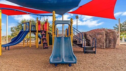 Discover new homes within the only gated community in Gladden Farms. Coronet at Gladden Farms, a premier D.R. Horton community where modern living meets the scenic charm of Marana, Arizona. Located within the expansive Gladden Farms master-planned neighborhood, Coronet offers residents the perfect blend of small-town warmth and modern amenities. Surrounded by 830 acres of green space, 28 parks, and 19 playgrounds, this gated community is designed for families who value both comfort and outdoor adventure. Residents of Coronet at Gladden Farms enjoy exclusive amenities such as a sparkling community pool, jacuzzi, fitness center, and a clubhouse complete with a BBQ area and patio. The gated community also offers walking trails, a dog park, and playgrounds, making it the ideal environment for families and active lifestyles. Each home is thoughtfully designed with high-end finishes, including quartz countertops, wood-look luxury vinyl plank flooring, tile roofs, Spanish Lace stucco exteriors and beautifully landscaped front yards with auto drip irrigation. Additionally, all homes feature covered front porches and back patios, perfect for enjoying the stunning Arizona sunsets and monsoons. Coronet at Gladden Farms is built with a commitment to energy efficiency and sustainability. Each home meets the DOE Zero Energy Ready Home standards, meaning they are constructed to be so energy-efficient that a renewable energy system could offset most or all of the home's annual energy use. These homes include advanced features such as tankless water heaters, energy-efficient LED lighting, and high-performance insulation, ensuring lower utility costs and a reduced environmental footprint. The Home is Connected Smart Home package, which includes a smart thermostat, video doorbell, keyless entry, a Wi-Fi-enabled garage door opener, and much more, provides modern convenience and enhanced security. Living in Coronet at Gladden Farms means being part of a thriving community with easy access to shopping, dining, and recreation. The greater Gladden Farms area is equipped with amenities like a splashpad, soccer fields, and the Paws & Claws Dog Park. With the new Fry’s Marketplace, along with Starbucks and Ace Hardware, all your daily needs are just moments away. Families will appreciate being part of the Marana Unified School District, with Gladden Farms Elementary nearby and a new K-8 school opening in 2025. Beyond the community, residents can explore the natural beauty of the area with proximity to Picacho Peak State Park, Tortolita Mountain Park, and Saguaro National Park, offering endless opportunities for hiking, cycling, and wildlife viewing. Major employers such as Davis-Monthan Air Force Base, Raytheon, and Ventana Medical Systems are just a short drive away, making Coronet at Gladden Farms an ideal location for those commuting to Tucson, Casa Grande, or Phoenix. Experience the perfect blend of comfort, convenience, and community at Coronet at Gladden Farms—where new homes, energy efficiency, and a vibrant lifestyle await.