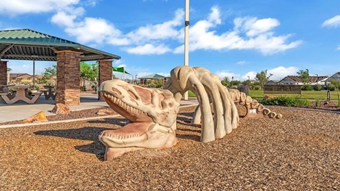 Discover new homes within the only gated community in Gladden Farms. Coronet at Gladden Farms, a premier D.R. Horton community where modern living meets the scenic charm of Marana, Arizona. Located within the expansive Gladden Farms master-planned neighborhood, Coronet offers residents the perfect blend of small-town warmth and modern amenities. Surrounded by 830 acres of green space, 28 parks, and 19 playgrounds, this gated community is designed for families who value both comfort and outdoor adventure. Residents of Coronet at Gladden Farms enjoy exclusive amenities such as a sparkling community pool, jacuzzi, fitness center, and a clubhouse complete with a BBQ area and patio. The gated community also offers walking trails, a dog park, and playgrounds, making it the ideal environment for families and active lifestyles. Each home is thoughtfully designed with high-end finishes, including quartz countertops, wood-look luxury vinyl plank flooring, tile roofs, Spanish Lace stucco exteriors and beautifully landscaped front yards with auto drip irrigation. Additionally, all homes feature covered front porches and back patios, perfect for enjoying the stunning Arizona sunsets and monsoons. Coronet at Gladden Farms is built with a commitment to energy efficiency and sustainability. Each home meets the DOE Zero Energy Ready Home standards, meaning they are constructed to be so energy-efficient that a renewable energy system could offset most or all of the home's annual energy use. These homes include advanced features such as tankless water heaters, energy-efficient LED lighting, and high-performance insulation, ensuring lower utility costs and a reduced environmental footprint. The Home is Connected Smart Home package, which includes a smart thermostat, video doorbell, keyless entry, a Wi-Fi-enabled garage door opener, and much more, provides modern convenience and enhanced security. Living in Coronet at Gladden Farms means being part of a thriving community with easy access to shopping, dining, and recreation. The greater Gladden Farms area is equipped with amenities like a splashpad, soccer fields, and the Paws & Claws Dog Park. With the new Fry’s Marketplace, along with Starbucks and Ace Hardware, all your daily needs are just moments away. Families will appreciate being part of the Marana Unified School District, with Gladden Farms Elementary nearby and a new K-8 school opening in 2025. Beyond the community, residents can explore the natural beauty of the area with proximity to Picacho Peak State Park, Tortolita Mountain Park, and Saguaro National Park, offering endless opportunities for hiking, cycling, and wildlife viewing. Major employers such as Davis-Monthan Air Force Base, Raytheon, and Ventana Medical Systems are just a short drive away, making Coronet at Gladden Farms an ideal location for those commuting to Tucson, Casa Grande, or Phoenix. Experience the perfect blend of comfort, convenience, and community at Coronet at Gladden Farms—where new homes, energy efficiency, and a vibrant lifestyle await.