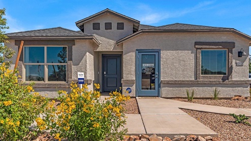 Welcome to Senita Crossing, a premier new home community by D.R. Horton, located in Tucson’s thriving southeast side. These thoughtfully crafted 3- and 4-bedroom new homes range from 1,200 to 2,200 square feet, providing the perfect blend of comfort and modern design. With easy access to I-10, Senita Crossing is conveniently situated near Davis-Monthan Air Force Base, the University of Arizona, and major employers like Raytheon, making it an ideal choice for families and professionals alike.  Each new home in Senita Crossing is designed with spacious living in mind, offering large, fully fenced backyards, covered patios, and inviting front porches. Inside, you’ll find elegant 12”x12” ceramic tile flooring throughout most areas, complemented by granite countertops and stylish Shaker cabinetry. Modern conveniences include stainless steel appliances such as a gas range, microwave, and dishwasher, all designed to enhance your daily living experience. Additionally, the Home is Connected® Smart Home package, which includes a smart thermostat, video doorbell, keyless entry, and more ensures that your home is as functional as it is beautiful.  Energy efficiency is a cornerstone of Senita Crossing’s new homes, which are DOE Zero Energy Ready. These homes feature tankless water heaters, LED lighting, and advanced spray foam insulation to ensure lower energy costs and a smaller carbon footprint, offering you a sustainable and cost-effective living environment. The community itself is designed with families in mind, featuring a park with a playground, a ramada, and a grassy common area, as well as a maintained bike and walking trail that connects to McCain Loop, providing ample opportunities for outdoor recreation.  Senita Crossing is located within the highly regarded Sunnyside Unified School District, offering access to top-rated schools such as Los Niños Elementary, Lauffer Middle School, and Desert View High School. For those seeking specialized education, the nearby Gallego Primary Fine Arts Magnet School is an excellent option for families. The community’s prime location ensures that you are never far from the essentials. With I-10 nearby, commuting is a breeze, and Tucson International Airport is just minutes away. Residents will also enjoy convenient access to shopping centers, local Carnecerias, and dining in some of the best restaurants in Tucson.  For those who appreciate outdoor activities and cultural attractions, Senita Crossing is just a short drive from Sabino Canyon, Reid Park Zoo, Tucson Botanical Gardens, and Kino Sports Complex. At Senita Crossing, D.R. Horton’s commitment to quality and innovative design is evident in every detail. Discover your ideal home in a community that offers everything you need to live your best life.