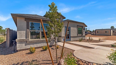 Welcome to Senita Crossing, a premier new home community by D.R. Horton, located in Tucson’s thriving southeast side. These thoughtfully crafted 3- and 4-bedroom new homes range from 1,200 to 2,200 square feet, providing the perfect blend of comfort and modern design. With easy access to I-10, Senita Crossing is conveniently situated near Davis-Monthan Air Force Base, the University of Arizona, and major employers like Raytheon, making it an ideal choice for families and professionals alike.  Each new home in Senita Crossing is designed with spacious living in mind, offering large, fully fenced backyards, covered patios, and inviting front porches. Inside, you’ll find elegant 12”x12” ceramic tile flooring throughout most areas, complemented by granite countertops and stylish Shaker cabinetry. Modern conveniences include stainless steel appliances such as a gas range, microwave, and dishwasher, all designed to enhance your daily living experience. Additionally, the Home is Connected® Smart Home package, which includes a smart thermostat, video doorbell, keyless entry, and more ensures that your home is as functional as it is beautiful.  Energy efficiency is a cornerstone of Senita Crossing’s new homes, which are DOE Zero Energy Ready. These homes feature tankless water heaters, LED lighting, and advanced spray foam insulation to ensure lower energy costs and a smaller carbon footprint, offering you a sustainable and cost-effective living environment. The community itself is designed with families in mind, featuring a park with a playground, a ramada, and a grassy common area, as well as a maintained bike and walking trail that connects to McCain Loop, providing ample opportunities for outdoor recreation.  Senita Crossing is located within the highly regarded Sunnyside Unified School District, offering access to top-rated schools such as Los Niños Elementary, Lauffer Middle School, and Desert View High School. For those seeking specialized education, the nearby Gallego Primary Fine Arts Magnet School is an excellent option for families. The community’s prime location ensures that you are never far from the essentials. With I-10 nearby, commuting is a breeze, and Tucson International Airport is just minutes away. Residents will also enjoy convenient access to shopping centers, local Carnecerias, and dining in some of the best restaurants in Tucson.  For those who appreciate outdoor activities and cultural attractions, Senita Crossing is just a short drive from Sabino Canyon, Reid Park Zoo, Tucson Botanical Gardens, and Kino Sports Complex. At Senita Crossing, D.R. Horton’s commitment to quality and innovative design is evident in every detail. Discover your ideal home in a community that offers everything you need to live your best life.