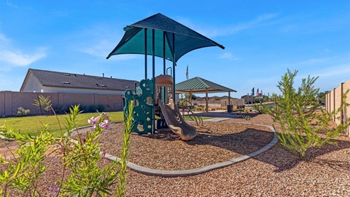 Welcome to Senita Crossing, a premier new home community by D.R. Horton, located in Tucson’s thriving southeast side. These thoughtfully crafted 3- and 4-bedroom new homes range from 1,200 to 2,200 square feet, providing the perfect blend of comfort and modern design. With easy access to I-10, Senita Crossing is conveniently situated near Davis-Monthan Air Force Base, the University of Arizona, and major employers like Raytheon, making it an ideal choice for families and professionals alike.  Each new home in Senita Crossing is designed with spacious living in mind, offering large, fully fenced backyards, covered patios, and inviting front porches. Inside, you’ll find elegant 12”x12” ceramic tile flooring throughout most areas, complemented by granite countertops and stylish Shaker cabinetry. Modern conveniences include stainless steel appliances such as a gas range, microwave, and dishwasher, all designed to enhance your daily living experience. Additionally, the Home is Connected® Smart Home package, which includes a smart thermostat, video doorbell, keyless entry, and more ensures that your home is as functional as it is beautiful.  Energy efficiency is a cornerstone of Senita Crossing’s new homes, which are DOE Zero Energy Ready. These homes feature tankless water heaters, LED lighting, and advanced spray foam insulation to ensure lower energy costs and a smaller carbon footprint, offering you a sustainable and cost-effective living environment. The community itself is designed with families in mind, featuring a park with a playground, a ramada, and a grassy common area, as well as a maintained bike and walking trail that connects to McCain Loop, providing ample opportunities for outdoor recreation.  Senita Crossing is located within the highly regarded Sunnyside Unified School District, offering access to top-rated schools such as Los Niños Elementary, Lauffer Middle School, and Desert View High School. For those seeking specialized education, the nearby Gallego Primary Fine Arts Magnet School is an excellent option for families. The community’s prime location ensures that you are never far from the essentials. With I-10 nearby, commuting is a breeze, and Tucson International Airport is just minutes away. Residents will also enjoy convenient access to shopping centers, local Carnecerias, and dining in some of the best restaurants in Tucson.  For those who appreciate outdoor activities and cultural attractions, Senita Crossing is just a short drive from Sabino Canyon, Reid Park Zoo, Tucson Botanical Gardens, and Kino Sports Complex. At Senita Crossing, D.R. Horton’s commitment to quality and innovative design is evident in every detail. Discover your ideal home in a community that offers everything you need to live your best life.