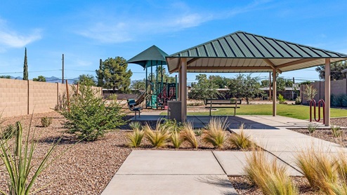 Welcome to Senita Crossing, a premier new home community by D.R. Horton, located in Tucson’s thriving southeast side. These thoughtfully crafted 3- and 4-bedroom new homes range from 1,200 to 2,200 square feet, providing the perfect blend of comfort and modern design. With easy access to I-10, Senita Crossing is conveniently situated near Davis-Monthan Air Force Base, the University of Arizona, and major employers like Raytheon, making it an ideal choice for families and professionals alike.  Each new home in Senita Crossing is designed with spacious living in mind, offering large, fully fenced backyards, covered patios, and inviting front porches. Inside, you’ll find elegant 12”x12” ceramic tile flooring throughout most areas, complemented by granite countertops and stylish Shaker cabinetry. Modern conveniences include stainless steel appliances such as a gas range, microwave, and dishwasher, all designed to enhance your daily living experience. Additionally, the Home is Connected® Smart Home package, which includes a smart thermostat, video doorbell, keyless entry, and more ensures that your home is as functional as it is beautiful.  Energy efficiency is a cornerstone of Senita Crossing’s new homes, which are DOE Zero Energy Ready. These homes feature tankless water heaters, LED lighting, and advanced spray foam insulation to ensure lower energy costs and a smaller carbon footprint, offering you a sustainable and cost-effective living environment. The community itself is designed with families in mind, featuring a park with a playground, a ramada, and a grassy common area, as well as a maintained bike and walking trail that connects to McCain Loop, providing ample opportunities for outdoor recreation.  Senita Crossing is located within the highly regarded Sunnyside Unified School District, offering access to top-rated schools such as Los Niños Elementary, Lauffer Middle School, and Desert View High School. For those seeking specialized education, the nearby Gallego Primary Fine Arts Magnet School is an excellent option for families. The community’s prime location ensures that you are never far from the essentials. With I-10 nearby, commuting is a breeze, and Tucson International Airport is just minutes away. Residents will also enjoy convenient access to shopping centers, local Carnecerias, and dining in some of the best restaurants in Tucson.  For those who appreciate outdoor activities and cultural attractions, Senita Crossing is just a short drive from Sabino Canyon, Reid Park Zoo, Tucson Botanical Gardens, and Kino Sports Complex. At Senita Crossing, D.R. Horton’s commitment to quality and innovative design is evident in every detail. Discover your ideal home in a community that offers everything you need to live your best life.