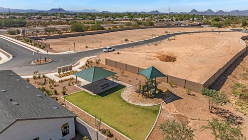 Welcome to Senita Crossing, a premier new home community by D.R. Horton, located in Tucson’s thriving southeast side. These thoughtfully crafted 3- and 4-bedroom new homes range from 1,200 to 2,200 square feet, providing the perfect blend of comfort and modern design. With easy access to I-10, Senita Crossing is conveniently situated near Davis-Monthan Air Force Base, the University of Arizona, and major employers like Raytheon, making it an ideal choice for families and professionals alike.  Each new home in Senita Crossing is designed with spacious living in mind, offering large, fully fenced backyards, covered patios, and inviting front porches. Inside, you’ll find elegant 12”x12” ceramic tile flooring throughout most areas, complemented by granite countertops and stylish Shaker cabinetry. Modern conveniences include stainless steel appliances such as a gas range, microwave, and dishwasher, all designed to enhance your daily living experience. Additionally, the Home is Connected® Smart Home package, which includes a smart thermostat, video doorbell, keyless entry, and more ensures that your home is as functional as it is beautiful.  Energy efficiency is a cornerstone of Senita Crossing’s new homes, which are DOE Zero Energy Ready. These homes feature tankless water heaters, LED lighting, and advanced spray foam insulation to ensure lower energy costs and a smaller carbon footprint, offering you a sustainable and cost-effective living environment. The community itself is designed with families in mind, featuring a park with a playground, a ramada, and a grassy common area, as well as a maintained bike and walking trail that connects to McCain Loop, providing ample opportunities for outdoor recreation.  Senita Crossing is located within the highly regarded Sunnyside Unified School District, offering access to top-rated schools such as Los Niños Elementary, Lauffer Middle School, and Desert View High School. For those seeking specialized education, the nearby Gallego Primary Fine Arts Magnet School is an excellent option for families. The community’s prime location ensures that you are never far from the essentials. With I-10 nearby, commuting is a breeze, and Tucson International Airport is just minutes away. Residents will also enjoy convenient access to shopping centers, local Carnecerias, and dining in some of the best restaurants in Tucson.  For those who appreciate outdoor activities and cultural attractions, Senita Crossing is just a short drive from Sabino Canyon, Reid Park Zoo, Tucson Botanical Gardens, and Kino Sports Complex. At Senita Crossing, D.R. Horton’s commitment to quality and innovative design is evident in every detail. Discover your ideal home in a community that offers everything you need to live your best life.
