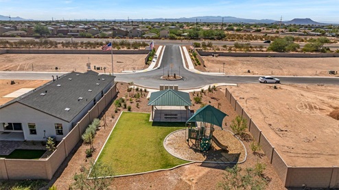 Welcome to Senita Crossing, a premier new home community by D.R. Horton, located in Tucson’s thriving southeast side. These thoughtfully crafted 3- and 4-bedroom new homes range from 1,200 to 2,200 square feet, providing the perfect blend of comfort and modern design. With easy access to I-10, Senita Crossing is conveniently situated near Davis-Monthan Air Force Base, the University of Arizona, and major employers like Raytheon, making it an ideal choice for families and professionals alike.  Each new home in Senita Crossing is designed with spacious living in mind, offering large, fully fenced backyards, covered patios, and inviting front porches. Inside, you’ll find elegant 12”x12” ceramic tile flooring throughout most areas, complemented by granite countertops and stylish Shaker cabinetry. Modern conveniences include stainless steel appliances such as a gas range, microwave, and dishwasher, all designed to enhance your daily living experience. Additionally, the Home is Connected® Smart Home package, which includes a smart thermostat, video doorbell, keyless entry, and more ensures that your home is as functional as it is beautiful.  Energy efficiency is a cornerstone of Senita Crossing’s new homes, which are DOE Zero Energy Ready. These homes feature tankless water heaters, LED lighting, and advanced spray foam insulation to ensure lower energy costs and a smaller carbon footprint, offering you a sustainable and cost-effective living environment. The community itself is designed with families in mind, featuring a park with a playground, a ramada, and a grassy common area, as well as a maintained bike and walking trail that connects to McCain Loop, providing ample opportunities for outdoor recreation.  Senita Crossing is located within the highly regarded Sunnyside Unified School District, offering access to top-rated schools such as Los Niños Elementary, Lauffer Middle School, and Desert View High School. For those seeking specialized education, the nearby Gallego Primary Fine Arts Magnet School is an excellent option for families. The community’s prime location ensures that you are never far from the essentials. With I-10 nearby, commuting is a breeze, and Tucson International Airport is just minutes away. Residents will also enjoy convenient access to shopping centers, local Carnecerias, and dining in some of the best restaurants in Tucson.  For those who appreciate outdoor activities and cultural attractions, Senita Crossing is just a short drive from Sabino Canyon, Reid Park Zoo, Tucson Botanical Gardens, and Kino Sports Complex. At Senita Crossing, D.R. Horton’s commitment to quality and innovative design is evident in every detail. Discover your ideal home in a community that offers everything you need to live your best life.