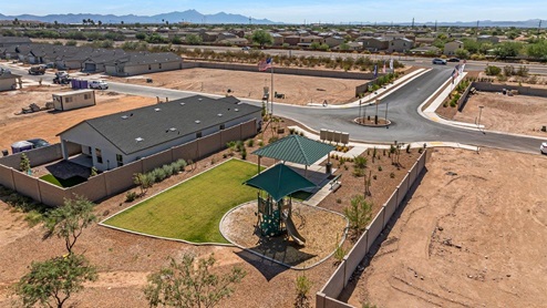 Welcome to Senita Crossing, a premier new home community by D.R. Horton, located in Tucson’s thriving southeast side. These thoughtfully crafted 3- and 4-bedroom new homes range from 1,200 to 2,200 square feet, providing the perfect blend of comfort and modern design. With easy access to I-10, Senita Crossing is conveniently situated near Davis-Monthan Air Force Base, the University of Arizona, and major employers like Raytheon, making it an ideal choice for families and professionals alike.  Each new home in Senita Crossing is designed with spacious living in mind, offering large, fully fenced backyards, covered patios, and inviting front porches. Inside, you’ll find elegant 12”x12” ceramic tile flooring throughout most areas, complemented by granite countertops and stylish Shaker cabinetry. Modern conveniences include stainless steel appliances such as a gas range, microwave, and dishwasher, all designed to enhance your daily living experience. Additionally, the Home is Connected® Smart Home package, which includes a smart thermostat, video doorbell, keyless entry, and more ensures that your home is as functional as it is beautiful.  Energy efficiency is a cornerstone of Senita Crossing’s new homes, which are DOE Zero Energy Ready. These homes feature tankless water heaters, LED lighting, and advanced spray foam insulation to ensure lower energy costs and a smaller carbon footprint, offering you a sustainable and cost-effective living environment. The community itself is designed with families in mind, featuring a park with a playground, a ramada, and a grassy common area, as well as a maintained bike and walking trail that connects to McCain Loop, providing ample opportunities for outdoor recreation.  Senita Crossing is located within the highly regarded Sunnyside Unified School District, offering access to top-rated schools such as Los Niños Elementary, Lauffer Middle School, and Desert View High School. For those seeking specialized education, the nearby Gallego Primary Fine Arts Magnet School is an excellent option for families. The community’s prime location ensures that you are never far from the essentials. With I-10 nearby, commuting is a breeze, and Tucson International Airport is just minutes away. Residents will also enjoy convenient access to shopping centers, local Carnecerias, and dining in some of the best restaurants in Tucson.  For those who appreciate outdoor activities and cultural attractions, Senita Crossing is just a short drive from Sabino Canyon, Reid Park Zoo, Tucson Botanical Gardens, and Kino Sports Complex. At Senita Crossing, D.R. Horton’s commitment to quality and innovative design is evident in every detail. Discover your ideal home in a community that offers everything you need to live your best life.