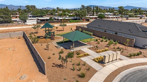 Welcome to Senita Crossing, a premier new home community by D.R. Horton, located in Tucson’s thriving southeast side. These thoughtfully crafted 3- and 4-bedroom new homes range from 1,200 to 2,200 square feet, providing the perfect blend of comfort and modern design. With easy access to I-10, Senita Crossing is conveniently situated near Davis-Monthan Air Force Base, the University of Arizona, and major employers like Raytheon, making it an ideal choice for families and professionals alike.  Each new home in Senita Crossing is designed with spacious living in mind, offering large, fully fenced backyards, covered patios, and inviting front porches. Inside, you’ll find elegant 12”x12” ceramic tile flooring throughout most areas, complemented by granite countertops and stylish Shaker cabinetry. Modern conveniences include stainless steel appliances such as a gas range, microwave, and dishwasher, all designed to enhance your daily living experience. Additionally, the Home is Connected® Smart Home package, which includes a smart thermostat, video doorbell, keyless entry, and more ensures that your home is as functional as it is beautiful.  Energy efficiency is a cornerstone of Senita Crossing’s new homes, which are DOE Zero Energy Ready. These homes feature tankless water heaters, LED lighting, and advanced spray foam insulation to ensure lower energy costs and a smaller carbon footprint, offering you a sustainable and cost-effective living environment. The community itself is designed with families in mind, featuring a park with a playground, a ramada, and a grassy common area, as well as a maintained bike and walking trail that connects to McCain Loop, providing ample opportunities for outdoor recreation.  Senita Crossing is located within the highly regarded Sunnyside Unified School District, offering access to top-rated schools such as Los Niños Elementary, Lauffer Middle School, and Desert View High School. For those seeking specialized education, the nearby Gallego Primary Fine Arts Magnet School is an excellent option for families. The community’s prime location ensures that you are never far from the essentials. With I-10 nearby, commuting is a breeze, and Tucson International Airport is just minutes away. Residents will also enjoy convenient access to shopping centers, local Carnecerias, and dining in some of the best restaurants in Tucson.  For those who appreciate outdoor activities and cultural attractions, Senita Crossing is just a short drive from Sabino Canyon, Reid Park Zoo, Tucson Botanical Gardens, and Kino Sports Complex. At Senita Crossing, D.R. Horton’s commitment to quality and innovative design is evident in every detail. Discover your ideal home in a community that offers everything you need to live your best life.