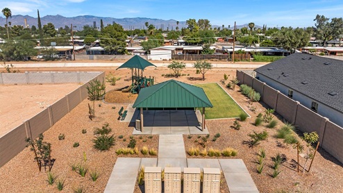Welcome to Senita Crossing, a premier new home community by D.R. Horton, located in Tucson’s thriving southeast side. These thoughtfully crafted 3- and 4-bedroom new homes range from 1,200 to 2,200 square feet, providing the perfect blend of comfort and modern design. With easy access to I-10, Senita Crossing is conveniently situated near Davis-Monthan Air Force Base, the University of Arizona, and major employers like Raytheon, making it an ideal choice for families and professionals alike.  Each new home in Senita Crossing is designed with spacious living in mind, offering large, fully fenced backyards, covered patios, and inviting front porches. Inside, you’ll find elegant 12”x12” ceramic tile flooring throughout most areas, complemented by granite countertops and stylish Shaker cabinetry. Modern conveniences include stainless steel appliances such as a gas range, microwave, and dishwasher, all designed to enhance your daily living experience. Additionally, the Home is Connected® Smart Home package, which includes a smart thermostat, video doorbell, keyless entry, and more ensures that your home is as functional as it is beautiful.  Energy efficiency is a cornerstone of Senita Crossing’s new homes, which are DOE Zero Energy Ready. These homes feature tankless water heaters, LED lighting, and advanced spray foam insulation to ensure lower energy costs and a smaller carbon footprint, offering you a sustainable and cost-effective living environment. The community itself is designed with families in mind, featuring a park with a playground, a ramada, and a grassy common area, as well as a maintained bike and walking trail that connects to McCain Loop, providing ample opportunities for outdoor recreation.  Senita Crossing is located within the highly regarded Sunnyside Unified School District, offering access to top-rated schools such as Los Niños Elementary, Lauffer Middle School, and Desert View High School. For those seeking specialized education, the nearby Gallego Primary Fine Arts Magnet School is an excellent option for families. The community’s prime location ensures that you are never far from the essentials. With I-10 nearby, commuting is a breeze, and Tucson International Airport is just minutes away. Residents will also enjoy convenient access to shopping centers, local Carnecerias, and dining in some of the best restaurants in Tucson.  For those who appreciate outdoor activities and cultural attractions, Senita Crossing is just a short drive from Sabino Canyon, Reid Park Zoo, Tucson Botanical Gardens, and Kino Sports Complex. At Senita Crossing, D.R. Horton’s commitment to quality and innovative design is evident in every detail. Discover your ideal home in a community that offers everything you need to live your best life.