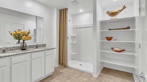 Welcome to Senita Crossing, a premier new home community by D.R. Horton, located in Tucson’s thriving southeast side. These thoughtfully crafted 3- and 4-bedroom new homes range from 1,200 to 2,200 square feet, providing the perfect blend of comfort and modern design. With easy access to I-10, Senita Crossing is conveniently situated near Davis-Monthan Air Force Base, the University of Arizona, and major employers like Raytheon, making it an ideal choice for families and professionals alike.  Each new home in Senita Crossing is designed with spacious living in mind, offering large, fully fenced backyards, covered patios, and inviting front porches. Inside, you’ll find elegant 12”x12” ceramic tile flooring throughout most areas, complemented by granite countertops and stylish Shaker cabinetry. Modern conveniences include stainless steel appliances such as a gas range, microwave, and dishwasher, all designed to enhance your daily living experience. Additionally, the Home is Connected® Smart Home package, which includes a smart thermostat, video doorbell, keyless entry, and more ensures that your home is as functional as it is beautiful.  Energy efficiency is a cornerstone of Senita Crossing’s new homes, which are DOE Zero Energy Ready. These homes feature tankless water heaters, LED lighting, and advanced spray foam insulation to ensure lower energy costs and a smaller carbon footprint, offering you a sustainable and cost-effective living environment. The community itself is designed with families in mind, featuring a park with a playground, a ramada, and a grassy common area, as well as a maintained bike and walking trail that connects to McCain Loop, providing ample opportunities for outdoor recreation.  Senita Crossing is located within the highly regarded Sunnyside Unified School District, offering access to top-rated schools such as Los Niños Elementary, Lauffer Middle School, and Desert View High School. For those seeking specialized education, the nearby Gallego Primary Fine Arts Magnet School is an excellent option for families. The community’s prime location ensures that you are never far from the essentials. With I-10 nearby, commuting is a breeze, and Tucson International Airport is just minutes away. Residents will also enjoy convenient access to shopping centers, local Carnecerias, and dining in some of the best restaurants in Tucson.  For those who appreciate outdoor activities and cultural attractions, Senita Crossing is just a short drive from Sabino Canyon, Reid Park Zoo, Tucson Botanical Gardens, and Kino Sports Complex. At Senita Crossing, D.R. Horton’s commitment to quality and innovative design is evident in every detail. Discover your ideal home in a community that offers everything you need to live your best life.