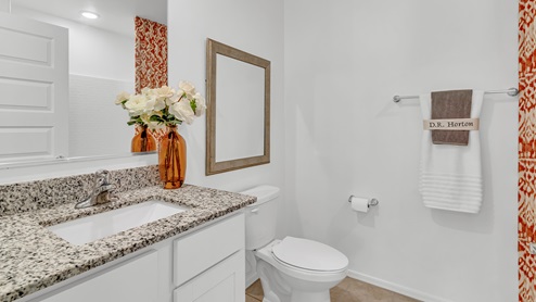 Welcome to Senita Crossing, a premier new home community by D.R. Horton, located in Tucson’s thriving southeast side. These thoughtfully crafted 3- and 4-bedroom new homes range from 1,200 to 2,200 square feet, providing the perfect blend of comfort and modern design. With easy access to I-10, Senita Crossing is conveniently situated near Davis-Monthan Air Force Base, the University of Arizona, and major employers like Raytheon, making it an ideal choice for families and professionals alike.  Each new home in Senita Crossing is designed with spacious living in mind, offering large, fully fenced backyards, covered patios, and inviting front porches. Inside, you’ll find elegant 12”x12” ceramic tile flooring throughout most areas, complemented by granite countertops and stylish Shaker cabinetry. Modern conveniences include stainless steel appliances such as a gas range, microwave, and dishwasher, all designed to enhance your daily living experience. Additionally, the Home is Connected® Smart Home package, which includes a smart thermostat, video doorbell, keyless entry, and more ensures that your home is as functional as it is beautiful.  Energy efficiency is a cornerstone of Senita Crossing’s new homes, which are DOE Zero Energy Ready. These homes feature tankless water heaters, LED lighting, and advanced spray foam insulation to ensure lower energy costs and a smaller carbon footprint, offering you a sustainable and cost-effective living environment. The community itself is designed with families in mind, featuring a park with a playground, a ramada, and a grassy common area, as well as a maintained bike and walking trail that connects to McCain Loop, providing ample opportunities for outdoor recreation.  Senita Crossing is located within the highly regarded Sunnyside Unified School District, offering access to top-rated schools such as Los Niños Elementary, Lauffer Middle School, and Desert View High School. For those seeking specialized education, the nearby Gallego Primary Fine Arts Magnet School is an excellent option for families. The community’s prime location ensures that you are never far from the essentials. With I-10 nearby, commuting is a breeze, and Tucson International Airport is just minutes away. Residents will also enjoy convenient access to shopping centers, local Carnecerias, and dining in some of the best restaurants in Tucson.  For those who appreciate outdoor activities and cultural attractions, Senita Crossing is just a short drive from Sabino Canyon, Reid Park Zoo, Tucson Botanical Gardens, and Kino Sports Complex. At Senita Crossing, D.R. Horton’s commitment to quality and innovative design is evident in every detail. Discover your ideal home in a community that offers everything you need to live your best life.