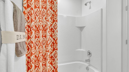 Welcome to Senita Crossing, a premier new home community by D.R. Horton, located in Tucson’s thriving southeast side. These thoughtfully crafted 3- and 4-bedroom new homes range from 1,200 to 2,200 square feet, providing the perfect blend of comfort and modern design. With easy access to I-10, Senita Crossing is conveniently situated near Davis-Monthan Air Force Base, the University of Arizona, and major employers like Raytheon, making it an ideal choice for families and professionals alike.  Each new home in Senita Crossing is designed with spacious living in mind, offering large, fully fenced backyards, covered patios, and inviting front porches. Inside, you’ll find elegant 12”x12” ceramic tile flooring throughout most areas, complemented by granite countertops and stylish Shaker cabinetry. Modern conveniences include stainless steel appliances such as a gas range, microwave, and dishwasher, all designed to enhance your daily living experience. Additionally, the Home is Connected® Smart Home package, which includes a smart thermostat, video doorbell, keyless entry, and more ensures that your home is as functional as it is beautiful.  Energy efficiency is a cornerstone of Senita Crossing’s new homes, which are DOE Zero Energy Ready. These homes feature tankless water heaters, LED lighting, and advanced spray foam insulation to ensure lower energy costs and a smaller carbon footprint, offering you a sustainable and cost-effective living environment. The community itself is designed with families in mind, featuring a park with a playground, a ramada, and a grassy common area, as well as a maintained bike and walking trail that connects to McCain Loop, providing ample opportunities for outdoor recreation.  Senita Crossing is located within the highly regarded Sunnyside Unified School District, offering access to top-rated schools such as Los Niños Elementary, Lauffer Middle School, and Desert View High School. For those seeking specialized education, the nearby Gallego Primary Fine Arts Magnet School is an excellent option for families. The community’s prime location ensures that you are never far from the essentials. With I-10 nearby, commuting is a breeze, and Tucson International Airport is just minutes away. Residents will also enjoy convenient access to shopping centers, local Carnecerias, and dining in some of the best restaurants in Tucson.  For those who appreciate outdoor activities and cultural attractions, Senita Crossing is just a short drive from Sabino Canyon, Reid Park Zoo, Tucson Botanical Gardens, and Kino Sports Complex. At Senita Crossing, D.R. Horton’s commitment to quality and innovative design is evident in every detail. Discover your ideal home in a community that offers everything you need to live your best life.