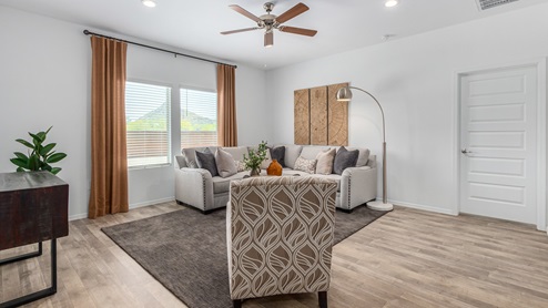 Discover the new homes at Roadrunner Estates, a serene D.R. Horton community nestled in the heart of Tucson, Arizona, where modern living meets the tranquility of nature. Situated just off Irvington Road and Camino de Oeste, this thoughtfully designed community offers an array of three-, four-, and five-bedroom homes, each crafted to provide comfort, convenience, and style. Each new home at Roadrunner Estates is equipped with an array of high-quality standard features, designed to enhance your living experience. Enjoy the benefits of professionally landscaped front and backyards with auto drip irrigation, creating a beautiful and low-maintenance outdoor space. Inside, the homes boast luxurious quartz countertops in the kitchens and bathrooms, stainless steel appliances, and wood-look flooring that brings warmth and elegance to the living spaces. With 9-foot ceilings, rounded drywall corners, hock & trowel wall texture, covered front porches and back patios, these homes are designed for both functionality and aesthetic appeal. Roadrunner Estates also includes the Home is Connected® Smart Home package, offering a suite of modern technology features such as a smart thermostat, video doorbell, keyless entry, Wi-Fi-enabled garage door opener, and energy-efficient LED lighting throughout. But what makes these homes truly special? They were meticulously finished in 2022 and exclusively rentals for a brief one-year stint. Now, we're making them available to call your forever home! This makes Roadrunner Estates Tucson's most centrally located and irresistible community. The community itself offers a tranquil and inviting atmosphere, complete with a neighborhood park, private backyards enclosed by modern rustic fencing, and stunning views of the surrounding mountains. The Spanish lace stucco exteriors add to the charm and durability of these homes, making them a lasting investment. Roadrunner Estates is ideally located at the base of Tucson Mountain Park, offering easy access to a variety of outdoor activities, including hiking and biking trails. The nearby Gates Pass Overlook is a local favorite for watching sunsets, while the Arizona-Sonora Desert Museum, Old Tucson, and San Xavier Church provide rich cultural and historical experiences. For your daily needs, the thriving Tucson Spectrum Shopping Center is just minutes away, offering a variety of shopping, dining, and entertainment options. Other nearby amenities include Casino del Sol, Manzanita Park with its pool and splash pad, and Desert Sports Fitness. The community’s proximity to Tucson International Airport, Davis-Monthan Air Force Base, and major employers makes it an ideal location for those seeking a balanced lifestyle. Experience the best of Tucson living at Roadrunner Estates, where your new home offers a perfect blend of modern convenience, aesthetic appeal, and natural beauty.