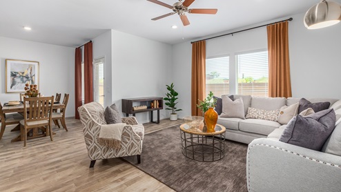 Discover the new homes at Roadrunner Estates, a serene D.R. Horton community nestled in the heart of Tucson, Arizona, where modern living meets the tranquility of nature. Situated just off Irvington Road and Camino de Oeste, this thoughtfully designed community offers an array of three-, four-, and five-bedroom homes, each crafted to provide comfort, convenience, and style. Each new home at Roadrunner Estates is equipped with an array of high-quality standard features, designed to enhance your living experience. Enjoy the benefits of professionally landscaped front and backyards with auto drip irrigation, creating a beautiful and low-maintenance outdoor space. Inside, the homes boast luxurious quartz countertops in the kitchens and bathrooms, stainless steel appliances, and wood-look flooring that brings warmth and elegance to the living spaces. With 9-foot ceilings, rounded drywall corners, hock & trowel wall texture, covered front porches and back patios, these homes are designed for both functionality and aesthetic appeal. Roadrunner Estates also includes the Home is Connected® Smart Home package, offering a suite of modern technology features such as a smart thermostat, video doorbell, keyless entry, Wi-Fi-enabled garage door opener, and energy-efficient LED lighting throughout. But what makes these homes truly special? They were meticulously finished in 2022 and exclusively rentals for a brief one-year stint. Now, we're making them available to call your forever home! This makes Roadrunner Estates Tucson's most centrally located and irresistible community. The community itself offers a tranquil and inviting atmosphere, complete with a neighborhood park, private backyards enclosed by modern rustic fencing, and stunning views of the surrounding mountains. The Spanish lace stucco exteriors add to the charm and durability of these homes, making them a lasting investment. Roadrunner Estates is ideally located at the base of Tucson Mountain Park, offering easy access to a variety of outdoor activities, including hiking and biking trails. The nearby Gates Pass Overlook is a local favorite for watching sunsets, while the Arizona-Sonora Desert Museum, Old Tucson, and San Xavier Church provide rich cultural and historical experiences. For your daily needs, the thriving Tucson Spectrum Shopping Center is just minutes away, offering a variety of shopping, dining, and entertainment options. Other nearby amenities include Casino del Sol, Manzanita Park with its pool and splash pad, and Desert Sports Fitness. The community’s proximity to Tucson International Airport, Davis-Monthan Air Force Base, and major employers makes it an ideal location for those seeking a balanced lifestyle. Experience the best of Tucson living at Roadrunner Estates, where your new home offers a perfect blend of modern convenience, aesthetic appeal, and natural beauty.