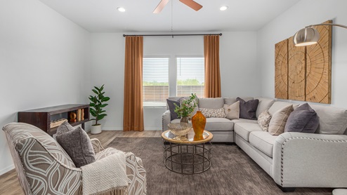 Discover the new homes at Roadrunner Estates, a serene D.R. Horton community nestled in the heart of Tucson, Arizona, where modern living meets the tranquility of nature. Situated just off Irvington Road and Camino de Oeste, this thoughtfully designed community offers an array of three-, four-, and five-bedroom homes, each crafted to provide comfort, convenience, and style. Each new home at Roadrunner Estates is equipped with an array of high-quality standard features, designed to enhance your living experience. Enjoy the benefits of professionally landscaped front and backyards with auto drip irrigation, creating a beautiful and low-maintenance outdoor space. Inside, the homes boast luxurious quartz countertops in the kitchens and bathrooms, stainless steel appliances, and wood-look flooring that brings warmth and elegance to the living spaces. With 9-foot ceilings, rounded drywall corners, hock & trowel wall texture, covered front porches and back patios, these homes are designed for both functionality and aesthetic appeal. Roadrunner Estates also includes the Home is Connected® Smart Home package, offering a suite of modern technology features such as a smart thermostat, video doorbell, keyless entry, Wi-Fi-enabled garage door opener, and energy-efficient LED lighting throughout. But what makes these homes truly special? They were meticulously finished in 2022 and exclusively rentals for a brief one-year stint. Now, we're making them available to call your forever home! This makes Roadrunner Estates Tucson's most centrally located and irresistible community. The community itself offers a tranquil and inviting atmosphere, complete with a neighborhood park, private backyards enclosed by modern rustic fencing, and stunning views of the surrounding mountains. The Spanish lace stucco exteriors add to the charm and durability of these homes, making them a lasting investment. Roadrunner Estates is ideally located at the base of Tucson Mountain Park, offering easy access to a variety of outdoor activities, including hiking and biking trails. The nearby Gates Pass Overlook is a local favorite for watching sunsets, while the Arizona-Sonora Desert Museum, Old Tucson, and San Xavier Church provide rich cultural and historical experiences. For your daily needs, the thriving Tucson Spectrum Shopping Center is just minutes away, offering a variety of shopping, dining, and entertainment options. Other nearby amenities include Casino del Sol, Manzanita Park with its pool and splash pad, and Desert Sports Fitness. The community’s proximity to Tucson International Airport, Davis-Monthan Air Force Base, and major employers makes it an ideal location for those seeking a balanced lifestyle. Experience the best of Tucson living at Roadrunner Estates, where your new home offers a perfect blend of modern convenience, aesthetic appeal, and natural beauty.