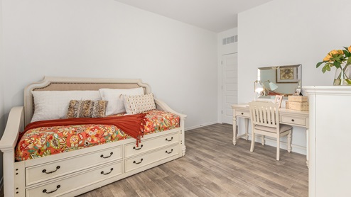 Discover the new homes at Roadrunner Estates, a serene D.R. Horton community nestled in the heart of Tucson, Arizona, where modern living meets the tranquility of nature. Situated just off Irvington Road and Camino de Oeste, this thoughtfully designed community offers an array of three-, four-, and five-bedroom homes, each crafted to provide comfort, convenience, and style. Each new home at Roadrunner Estates is equipped with an array of high-quality standard features, designed to enhance your living experience. Enjoy the benefits of professionally landscaped front and backyards with auto drip irrigation, creating a beautiful and low-maintenance outdoor space. Inside, the homes boast luxurious quartz countertops in the kitchens and bathrooms, stainless steel appliances, and wood-look flooring that brings warmth and elegance to the living spaces. With 9-foot ceilings, rounded drywall corners, hock & trowel wall texture, covered front porches and back patios, these homes are designed for both functionality and aesthetic appeal. Roadrunner Estates also includes the Home is Connected® Smart Home package, offering a suite of modern technology features such as a smart thermostat, video doorbell, keyless entry, Wi-Fi-enabled garage door opener, and energy-efficient LED lighting throughout. But what makes these homes truly special? They were meticulously finished in 2022 and exclusively rentals for a brief one-year stint. Now, we're making them available to call your forever home! This makes Roadrunner Estates Tucson's most centrally located and irresistible community. The community itself offers a tranquil and inviting atmosphere, complete with a neighborhood park, private backyards enclosed by modern rustic fencing, and stunning views of the surrounding mountains. The Spanish lace stucco exteriors add to the charm and durability of these homes, making them a lasting investment. Roadrunner Estates is ideally located at the base of Tucson Mountain Park, offering easy access to a variety of outdoor activities, including hiking and biking trails. The nearby Gates Pass Overlook is a local favorite for watching sunsets, while the Arizona-Sonora Desert Museum, Old Tucson, and San Xavier Church provide rich cultural and historical experiences. For your daily needs, the thriving Tucson Spectrum Shopping Center is just minutes away, offering a variety of shopping, dining, and entertainment options. Other nearby amenities include Casino del Sol, Manzanita Park with its pool and splash pad, and Desert Sports Fitness. The community’s proximity to Tucson International Airport, Davis-Monthan Air Force Base, and major employers makes it an ideal location for those seeking a balanced lifestyle. Experience the best of Tucson living at Roadrunner Estates, where your new home offers a perfect blend of modern convenience, aesthetic appeal, and natural beauty.