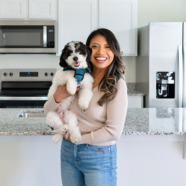 Happy woman celebrating new home