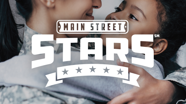 Woman hugging a girl and smiling with white words in front of it that says MAIN STREET STARS