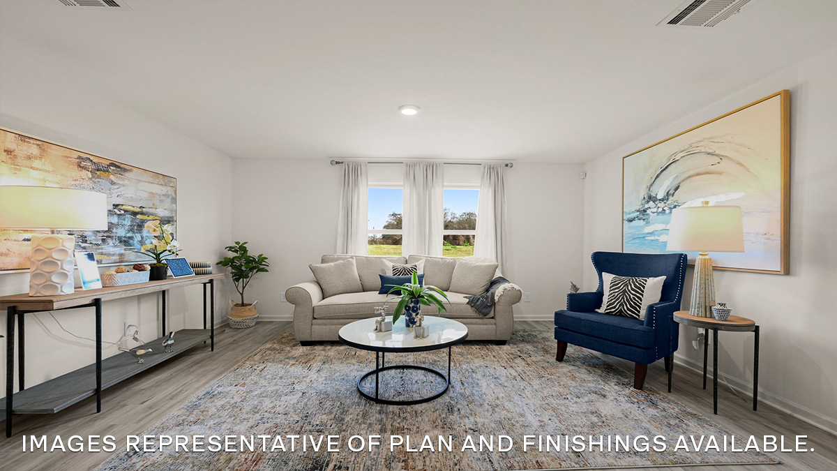 spacious living room with dual windows